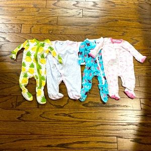 Four Designer Baby Onesies
